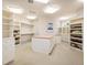 Large walk-in closet with ample shelving and drawers at 15895 W Bayaud Dr, Golden, CO 80401