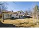 A large backyard with a grass lawn and patio offers space for outdoor living and entertainment at 9910 Winona St, Westminster, CO 80031