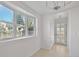 Entryway with large windows and light hardwood floors at 9910 Winona St, Westminster, CO 80031