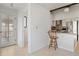 Kitchen area featuring a breakfast bar, cabinetry, and stainless steel appliances at 9910 Winona St, Westminster, CO 80031