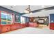 Basement with windows, fireplace, and wet bar with decorative trim at 3480 Spruce Dell Ct, Castle Rock, CO 80109
