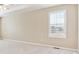 Bright bedroom with neutral carpet, large window with blinds and ample wall space at 3480 Spruce Dell Ct, Castle Rock, CO 80109