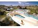 Community pool with water slide, sun loungers, and a clubhouse creating a resort-like setting at 3480 Spruce Dell Ct, Castle Rock, CO 80109