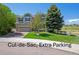Charming two-story home with a large front lawn, cul-de-sac, extra parking, and well-kept landscaping at 3480 Spruce Dell Ct, Castle Rock, CO 80109