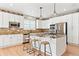 Spacious kitchen with granite countertops, a center island, and stainless steel appliances at 3480 Spruce Dell Ct, Castle Rock, CO 80109