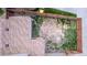 Aerial view of a fenced backyard with a partial grass cover and limited landscaping potential at 5733 Whitechapel St, Castle Rock, CO 80104