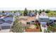 View of a house with fully fenced backyard, mature trees and a driveway at 5733 Whitechapel St, Castle Rock, CO 80104