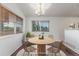 Dining area with a view from the windows, hardwood floors, and chandelier at 5733 Whitechapel St, Castle Rock, CO 80104