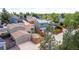 View of a home with fenced yard and well-manicured lawn in a suburban neighborhood with mature trees at 5733 Whitechapel St, Castle Rock, CO 80104