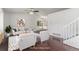 Bright living room showing the open-concept design and hardwood floors at 5733 Whitechapel St, Castle Rock, CO 80104