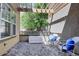 Outdoor patio with lattice wood, chairs and shade at 5887 S Taft Ln, Littleton, CO 80127