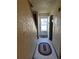 Clean entryway with tile floor and access to the backyard at 2218 Coronado N Pkwy # B, Denver, CO 80229