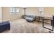 Spacious upstairs living room features lots of light and plush carpeting at 3216 Yale Dr, Broomfield, CO 80023
