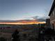 Enjoy breathtaking sunset views from the deck of this Broomfield home, featuring vibrant colors and peaceful scenery at 3216 Yale Dr, Broomfield, CO 80023