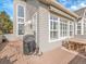 Home's outdoor deck with wooden table and seating area at 8312 S Peninsula Dr, Littleton, CO 80120