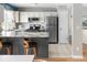 Updated kitchen with stainless steel appliances, ample counter space, and stylish backsplash at 11225 W 102Nd Pl, Westminster, CO 80021