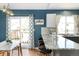 Kitchen featuring a center island with seating and stainless steel appliances at 11225 W 102Nd Pl, Westminster, CO 80021