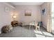 Playroom featuring soft carpet, furniture, neutral wall, and bright natural lighting at 11225 W 102Nd Pl, Westminster, CO 80021