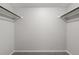 A walk in closet featuring carpet and custom shelving at 4899 S Dudley St # 19, Littleton, CO 80123