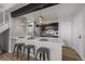 Bright and modern kitchen with stainless steel appliances and bar stool seating at 4899 S Dudley St # 19, Littleton, CO 80123