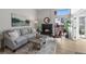 Inviting living room with a cozy fireplace and lots of natural light at 4899 S Dudley St # 19, Littleton, CO 80123