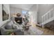 Comfortable living room featuring a fireplace, neutral decor, and bright lighting at 4899 S Dudley St # 19, Littleton, CO 80123