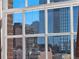 City view from window showcasing many glass buildings and blue skies on a clear day at 1616 14Th St # 4E, Denver, CO 80202