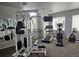 Stay fit with ease in this well-equipped fitness center featuring multiple machines and a TV screen at 8481 W Union Ave # 4-203, Littleton, CO 80123