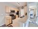 Well-designed kitchen with bar stool seating at the breakfast bar at 8481 W Union Ave # 4-203, Littleton, CO 80123