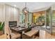 Dining room with fireplace, seating for six, and outdoor patio access at 581 Garfield St, Denver, CO 80206