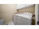 Functional laundry room equipped with a washer and dryer, providing convenience for household chores at 581 Garfield St, Denver, CO 80206