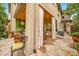 This covered patio offers a comfortable space for outdoor dining and relaxation, with a grill and cozy seating area at 581 Garfield St, Denver, CO 80206