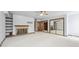 A living room features a fireplace and tile flooring at 4855 S Joplin St, Aurora, CO 80015