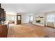 Living room showcases a fireplace and wood floors at 4855 S Joplin St, Aurora, CO 80015