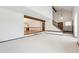 Inviting living room showcasing a vaulted ceiling and eye-catching dark wood beams at 4855 S Joplin St, Aurora, CO 80015
