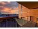 Private balcony with views of the city and mountains at sunset at 1301 Speer Blvd # 410, Denver, CO 80204