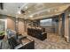 Residential theater room with comfortable seating and large screen at 1301 Speer Blvd # 410, Denver, CO 80204