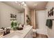 Charming bathroom features double sinks, stylish fixtures, and a shower-tub combo at 12354 E 101St Dr, Commerce City, CO 80022