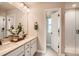 Spacious bathroom features double sinks, stone counters, and a glass-enclosed shower at 12354 E 101St Dr, Commerce City, CO 80022