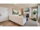 Cozy living room with a fireplace, plush seating, and stylish decor at 12354 E 101St Dr, Commerce City, CO 80022