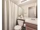 Cozy bathroom with a shower curtain, providing a functional and comfortable space at 6267 S Albion Ct, Centennial, CO 80121
