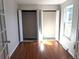 Bright bedroom with hardwood floors features two large closets and natural light from a large window at 6267 S Albion Ct, Centennial, CO 80121