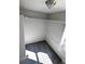 A walk-in closet with carpet flooring, white walls, and custom shelving to maximize storage and organization at 6267 S Albion Ct, Centennial, CO 80121