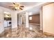 Finished basement area with tile flooring at 4865 Scranton Ct, Denver, CO 80239