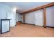 Unfinished basement with painted concrete floor at 4865 Scranton Ct, Denver, CO 80239