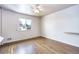 Bright bedroom with hardwood floors and ample closet space at 4865 Scranton Ct, Denver, CO 80239