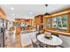 Spacious kitchen with stainless steel appliances, granite countertops, and wood cabinets at 32217 Buffalo Park Rd, Evergreen, CO 80439