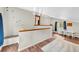Bright loft space with hardwood floors, built-in seating, and natural light at 32217 Buffalo Park Rd, Evergreen, CO 80439