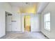 Bright bedroom with access to an ensuite bathroom, providing privacy and convenience at 1438 Stockton Dr, Erie, CO 80516