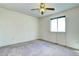 Bedroom with a ceiling fan, a window, neutral walls, and carpeted flooring at 1438 Stockton Dr, Erie, CO 80516